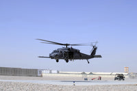 HH-60G Pave Hawk helicopter taking off from Camp Bastion, Afghanistan, medevac mission poster print.