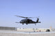 HH-60G Pave Hawk helicopter taking off from Camp Bastion, Afghanistan, medevac mission poster print.