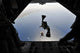 U.S. Air Force pararescueman jumping from HC-130P Hercules aircraft poster print.