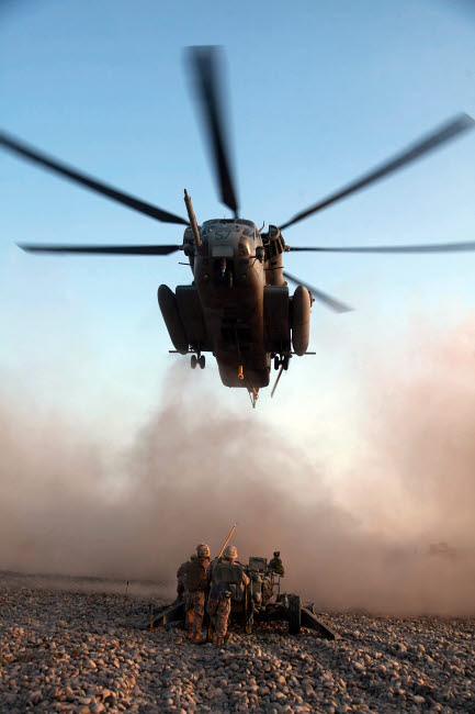 US Marines attaching M777A2 Howitzer to CH-53E Super Stallion helicopter poster print