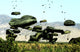 Bundles of food and water air delivery poster print depicting humanitarian efforts in Port-au-Prince, Haiti.