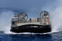 Landing Craft Air Cushion 84 conducting operations in the US 5th Fleet area poster print by Stocktrek Images.
