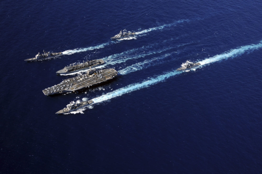 The Abraham Lincoln Carrier Strike Group ships in formation in the Pacific Ocean poster print