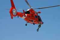 HH-65C Dolphin Helicopter Rescue Poster Print by Stocktrek Images