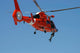 HH-65C Dolphin Helicopter Rescue Poster Print by Stocktrek Images
