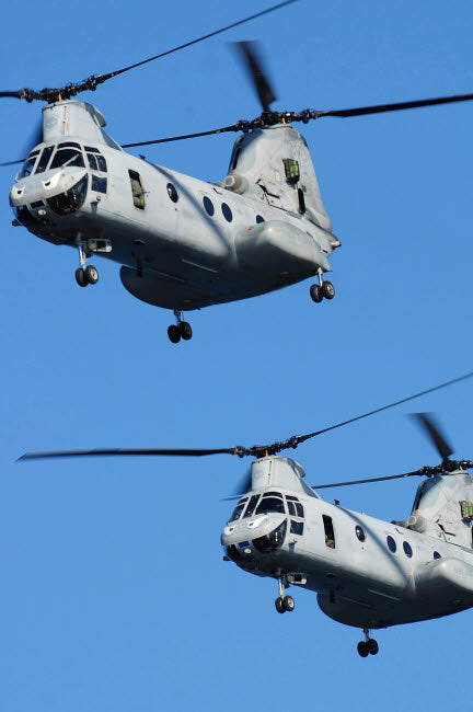 US Marine Corps CH-46E Sea Knight helicopters in flight poster print.