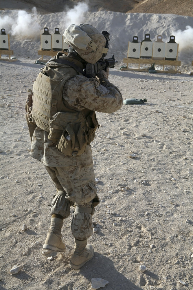 Soldier engaging target at Al Asad shooting range poster print.