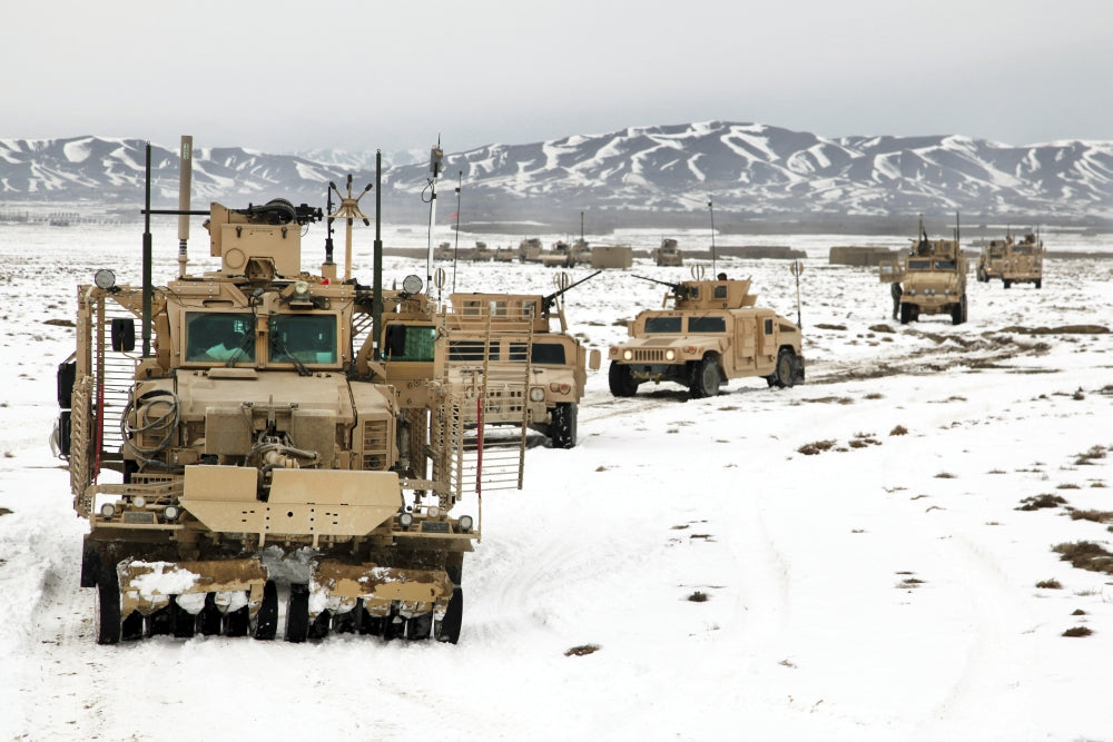 Convoy of vehicles during route clearing in Afghanistan poster print.