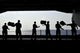 Pacific Ocean Sailors Poster Print showing sailors on USS Ronald Reagan passing kits.