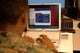 An Officer Works on a Tablet PC Poster Print - Stocktrek Images