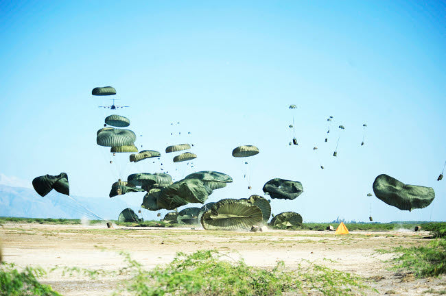 Humanitarian aid airdrop into Port-au-Prince, Haiti poster print