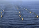 Aerial view of ships in formation during UNITAS 52 exercises in the Atlantic Ocean.