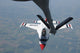U.S. Air Force Thunderbird pilot air-to-air refueling poster print featuring an F-16 Fighting Falcon.