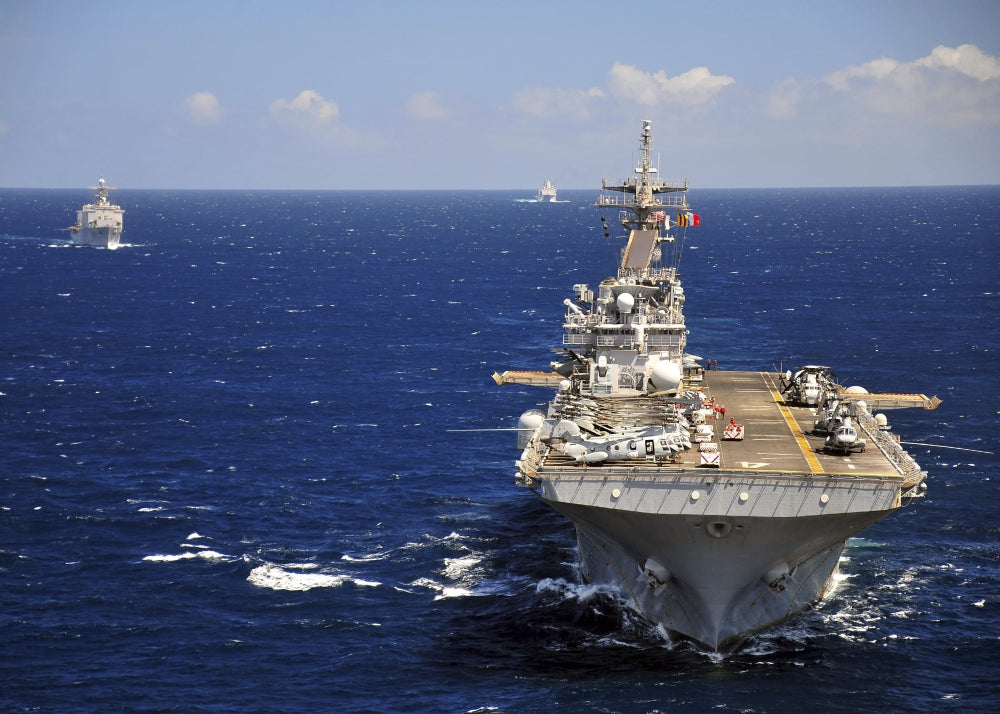 USS Boxer leads a convoy of ships in the Indian Ocean poster print.