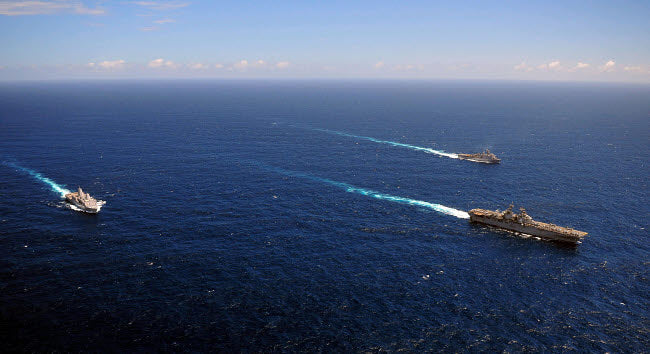 USS Boxer, USS Comstock and USS Green Bay transit the Indian Ocean Poster Print