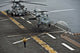 MH-60S Sea Hawk landing aboard USS Makin Island poster print.