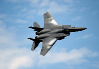 F-15E Strike Eagle soaring through the sky poster print.