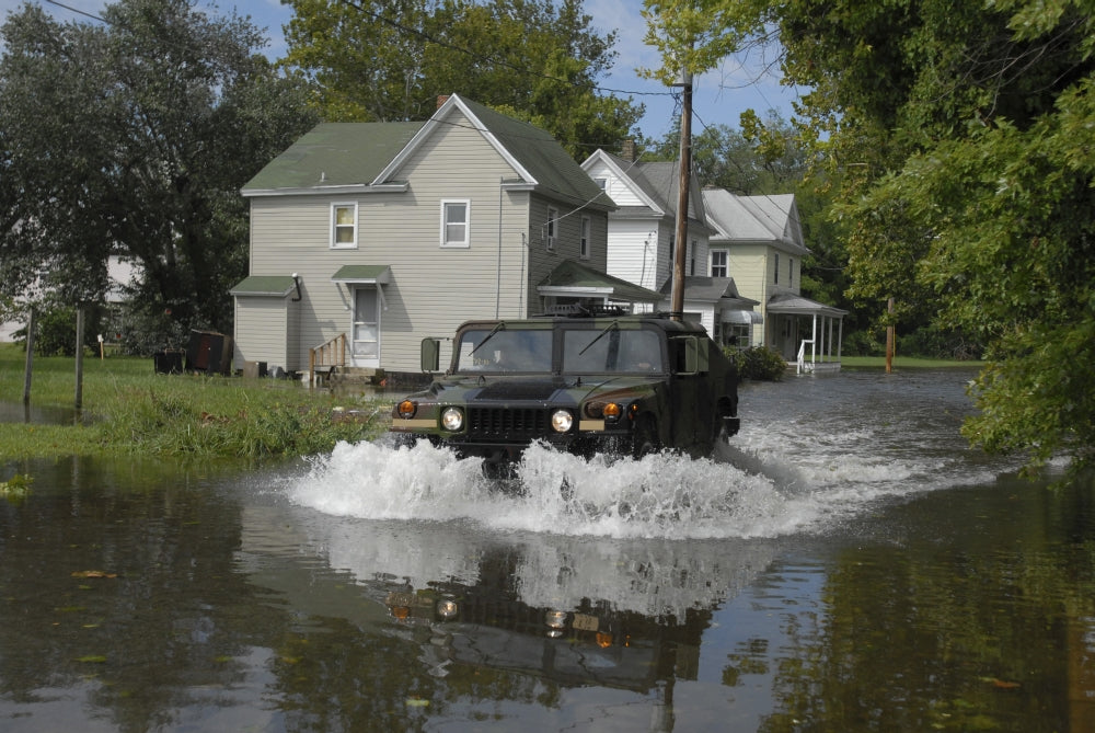 Humvee driving through floodwaters in Salisbury, Maryland poster print