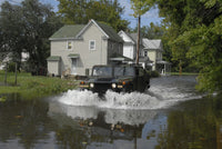 Humvee driving through floodwaters in Salisbury, Maryland poster print