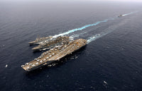 Underway replenishment with ships of the John C. Stennis Carrier Strike Group poster print