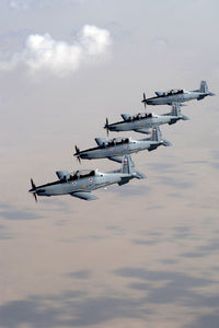 Iraqi Air Force T-6 Texan trainer aircraft poster print over Tikrit.