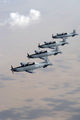 Iraqi Air Force T-6 Texan trainer aircraft poster print over Tikrit.
