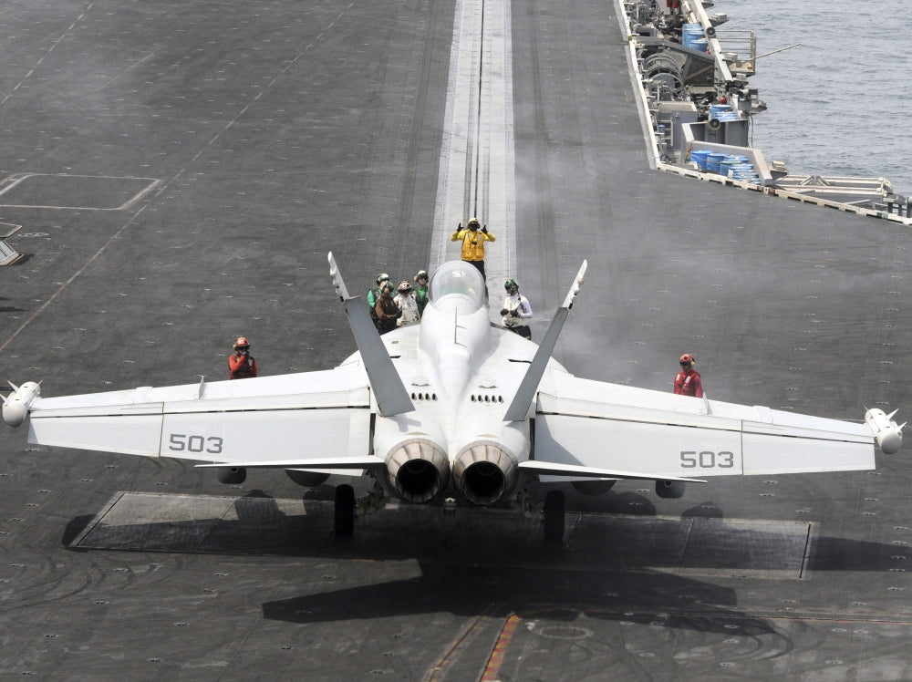 EA-18G Growler Poster Print featuring sailors performing pre-launch checks