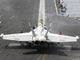 EA-18G Growler Poster Print featuring sailors performing pre-launch checks
