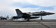 F/A-18C Hornet landing on USS John C. Stennis Poster Print