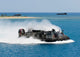 Landing craft air cushion approaches the USS Denver poster print