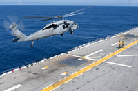 MH-60S Sea Hawk helicopter taking off from USS Essex