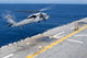 MH-60S Sea Hawk helicopter taking off from USS Essex