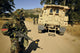 Seabees conduct a wash down of a suspicious vehicle poster print.