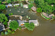 Missouri River Encroaches on Homes in Sioux City Poster Print by Stocktrek Images.