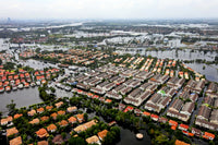 Aerial view of flood waters affecting an area of Thailand poster print