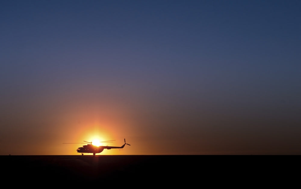 Sikorsky S-61L Mk II helicopter taxiing on the runway at sunrise poster print