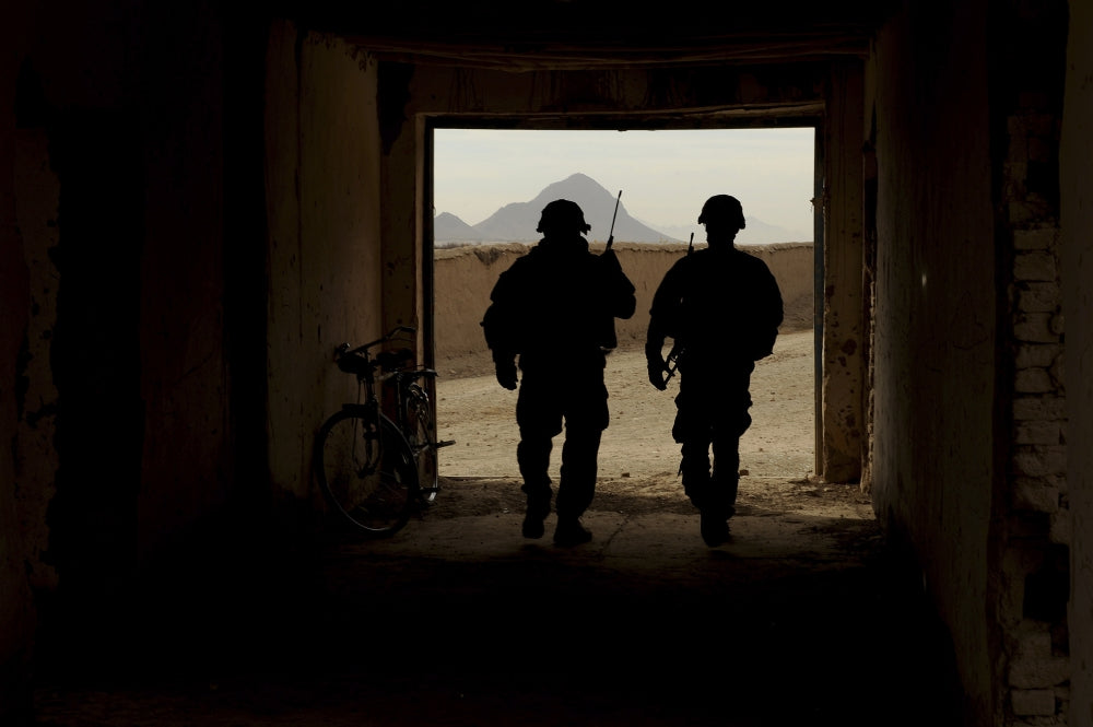 U.S. Army soldiers securing a school in Afghanistan poster print