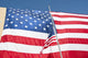 American flag poster print over headquarters building in Afghanistan