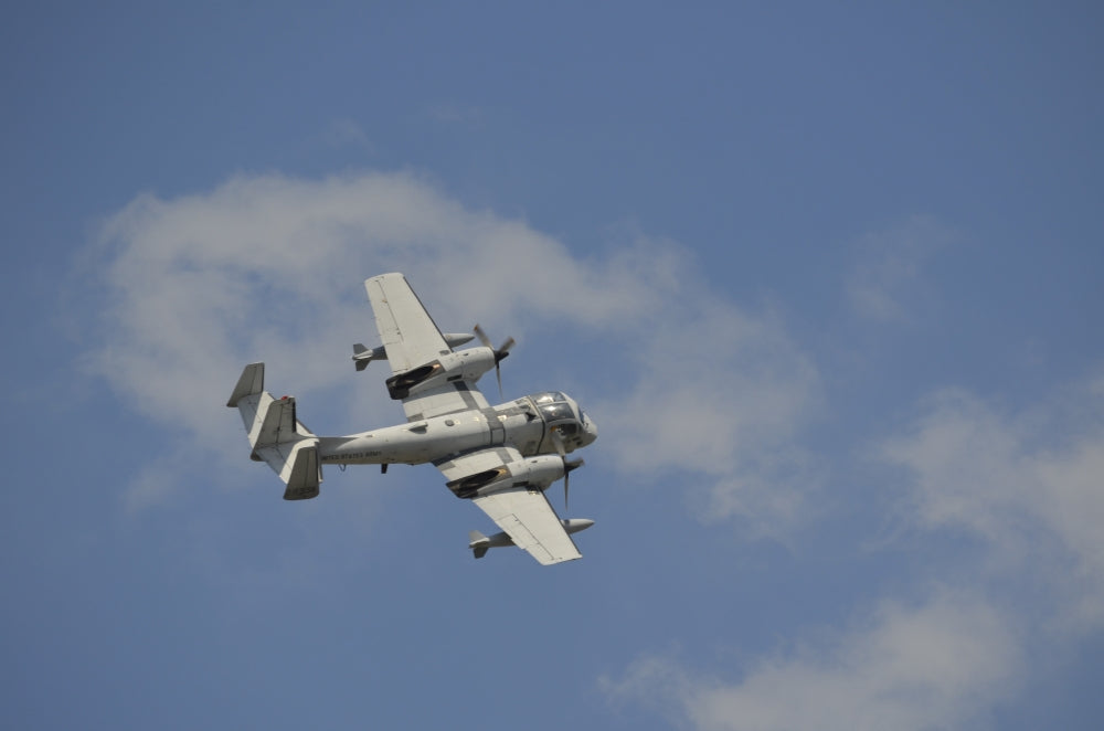 Grumman OV-1 Mohawk in flight poster print over Florida