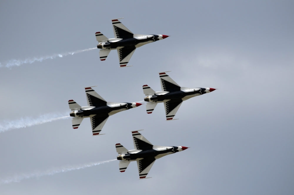 United States Air Force Thunderbirds flying in diamond formation over Lakeland, Florida.