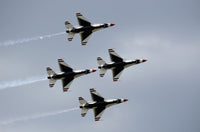 United States Air Force Thunderbirds flying in diamond formation over Lakeland, Florida.