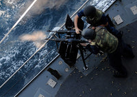 Sailors firing dual-mounted M240 machine gun aboard USS Bunker Hill poster print.