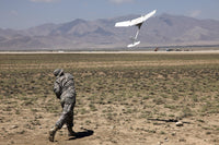 U.S. Army soldier launching RQ-11 Raven UAV poster print