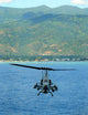 AH-1W Super Cobra Helicopter Poster Print by Stocktrek Images, flying off the coast of Dili, East Timor