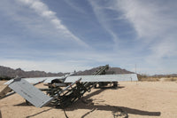 RQ-7 Shadow UAV positioned on trailer-mounted catapult at airfield in Arizona.