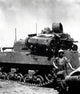 Japanese light tank poster print depicting a tank on a medium tank.