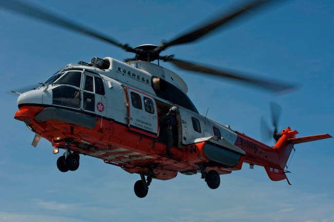 Hong Kong Government Flying Service AS 332 L2 Super Puma Poster Print showcasing a helicopter.