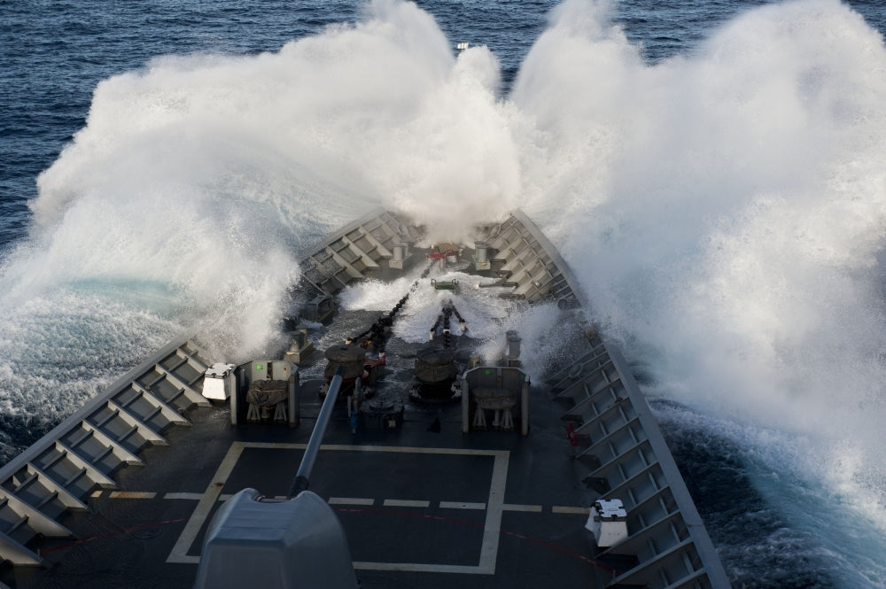 USS Cowpens Ticonderoga-class cruiser poster print navigating rough seas.