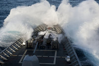 USS Cowpens Ticonderoga-class cruiser poster print navigating rough seas.
