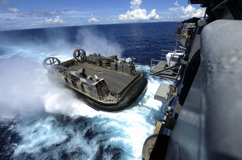 Landing craft air cushion entering the well deck of USS Bonhomme Richard poster print.